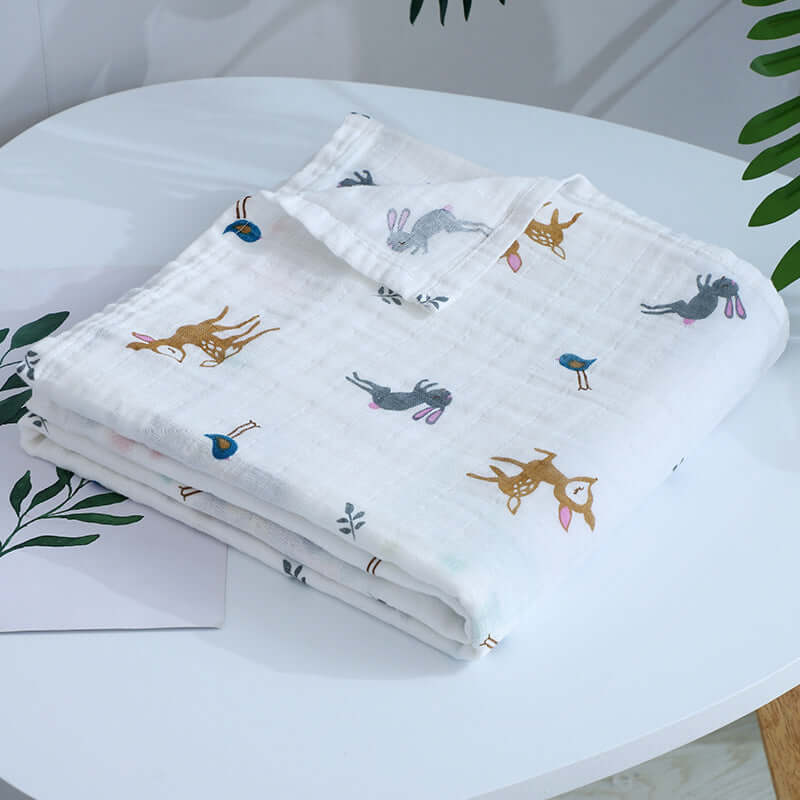 Breathable multi-use blanket in deer and rabbit design