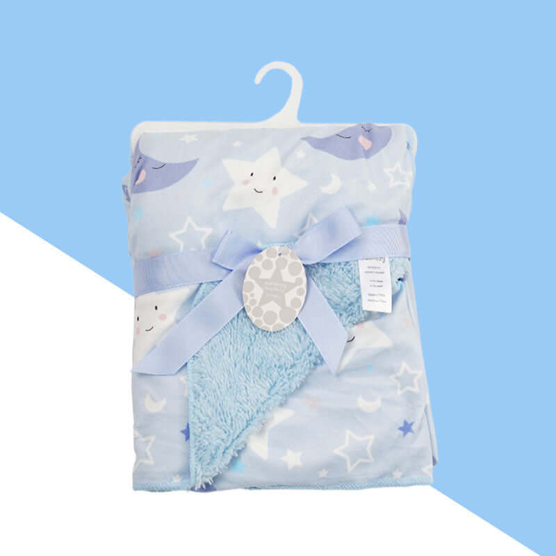 Ultra- soft plush baby blanket in blue star and moon design