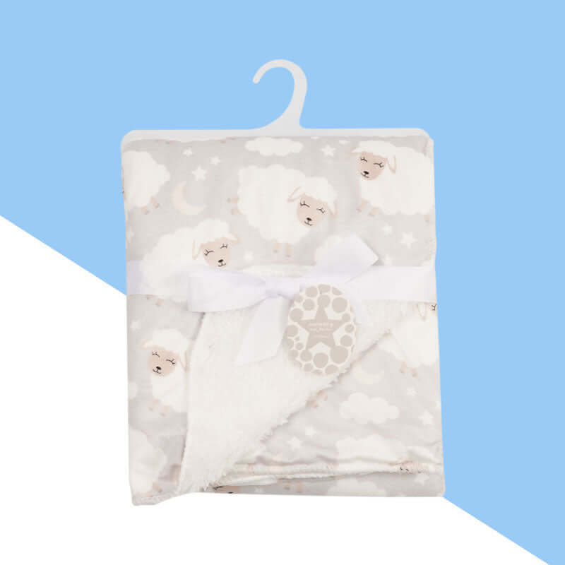 Ultra- soft plush baby blanket in white sheep design